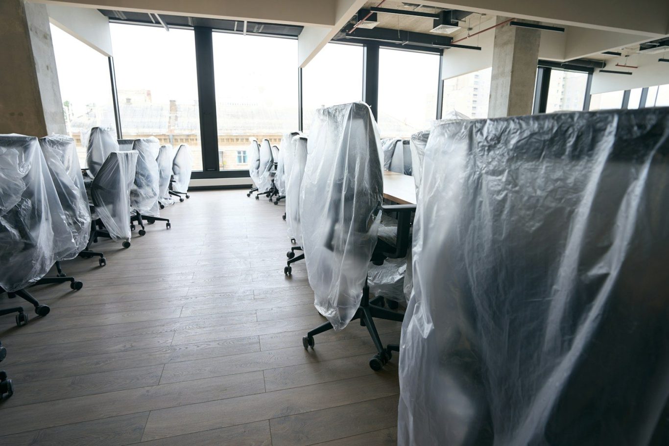 Professional office removals with furniture protection Office furniture protected during a professional office removal in Wrexham